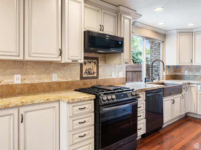 450 W Chokecherry Cir, Orem, UT 84058 - kitchen featuring gas range, dishwashing machine, a sink, dark wood finished floors, and ornamental molding