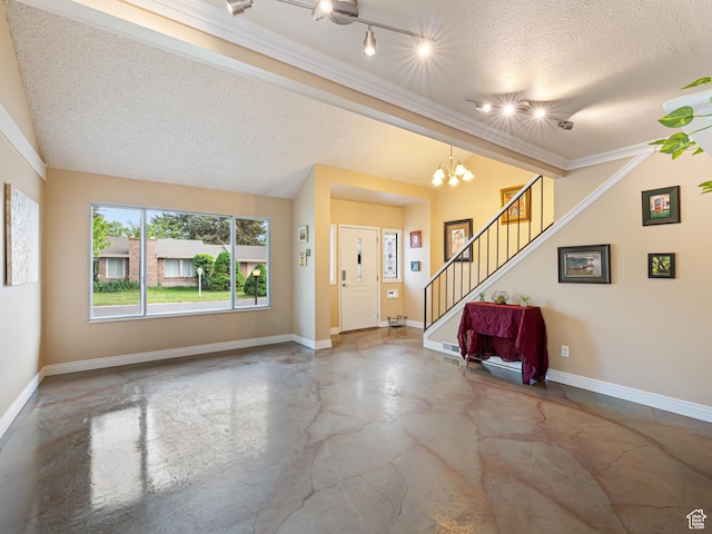 450 W Chokecherry Cir, Orem, UT 84058 - foyer featuring concrete floors, a textured ceiling, baseboards, stairway, and a chandelier