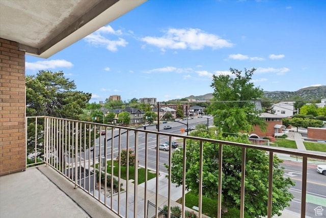 balcony featuring a mountain view