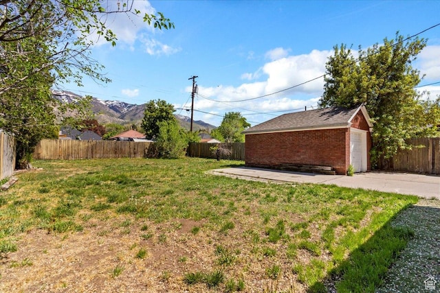 3214 Porter Ave, Ogden, UT 84403 - view of yard featuring an outbuilding and a garage