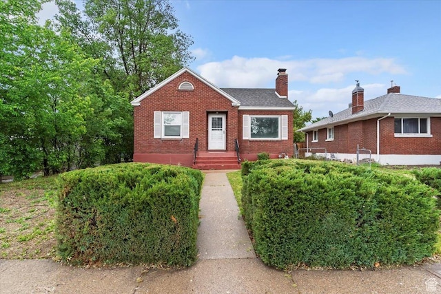 3214 Porter Ave, Ogden, UT 84403 - bungalow with brick siding and a chimney