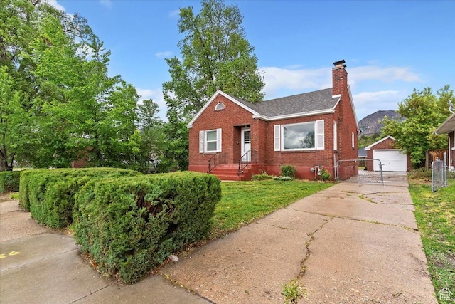 3214 Porter Ave, Ogden, UT 84403 - bungalow-style home with brick siding, a chimney, an outbuilding, a detached garage, and a shingled roof