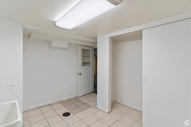 3214 Porter Ave, Ogden, UT 84403 - finished below grade area featuring light tile patterned floors