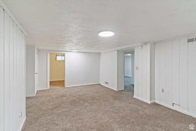 3214 Porter Ave, Ogden, UT 84403 - basement with carpet flooring, baseboards, and a textured ceiling