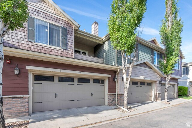1485 W 80 S, Pleasant Grove, UT 84062 - townhome / multi-family property with an attached garage and stone siding
