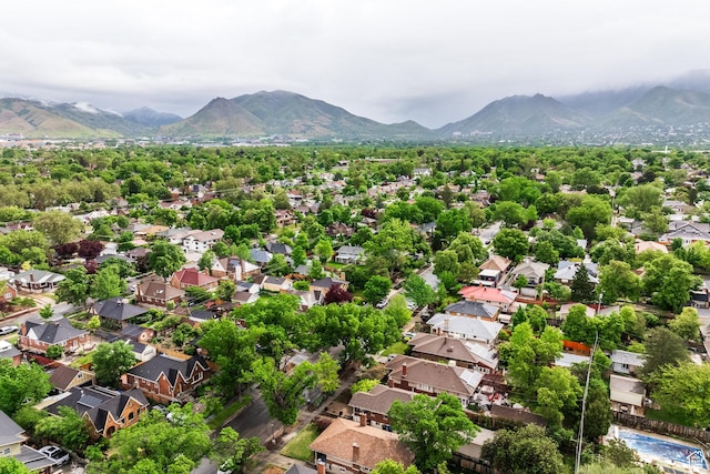 aerial perspective of suburban area featuring a mountainous background
