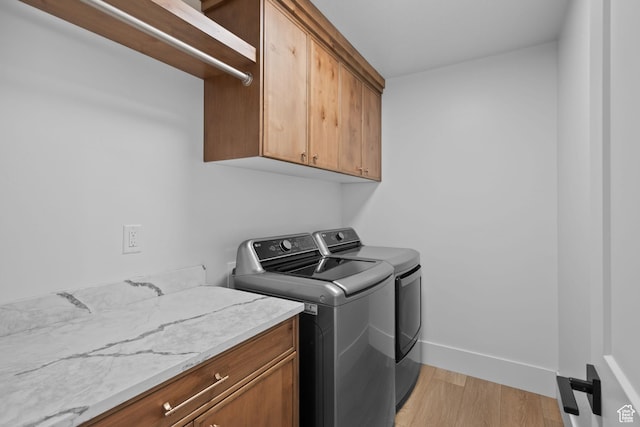 3232 E 5225 N, Eden, UT 84310 - laundry area with cabinet space, independent washer and dryer, light wood finished floors, and baseboards