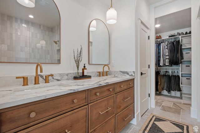 3232 E 5225 N, Eden, UT 84310 - full bath featuring double vanity, a spacious closet, and stone finish floors