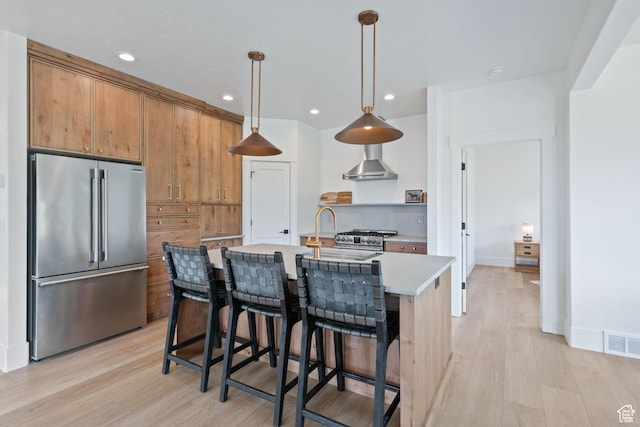 3232 E 5225 N, Eden, UT 84310 - kitchen with high end appliances, light wood finished floors, light countertops, hanging light fixtures, and recessed lighting