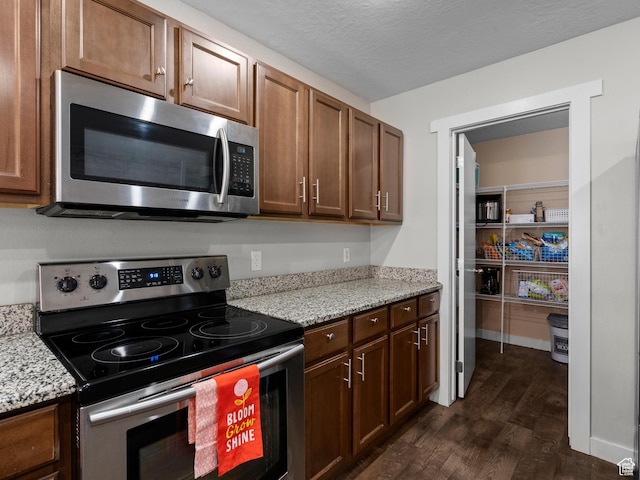1370 S 1500 W, Springville, UT 84663 - kitchen featuring stainless steel appliances, dark wood finished floors, and light stone countertops