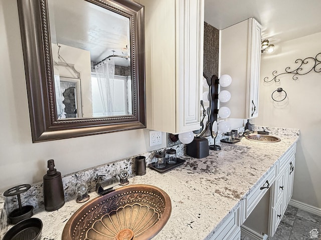 bathroom with double vanity
