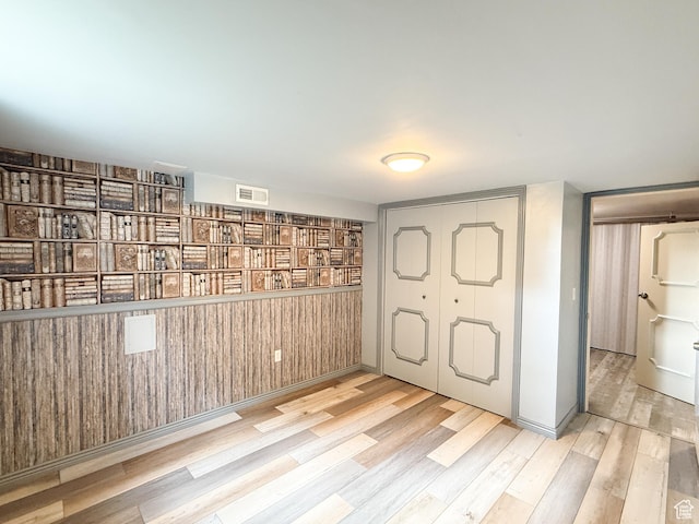 foyer entrance featuring wood finished floors