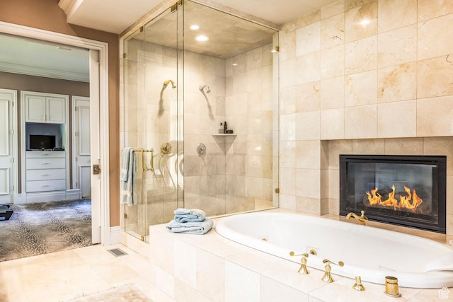 full bath with a shower stall, a whirlpool tub, ornamental molding, recessed lighting, and a tile fireplace