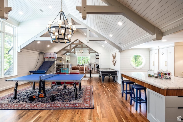 playroom featuring wood finished floors, a chandelier, billiards table, wood walls, and wood ceiling