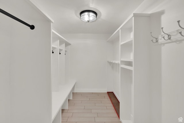 mudroom featuring wood finish floors