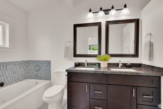 full bathroom with a bath, toilet, and double vanity