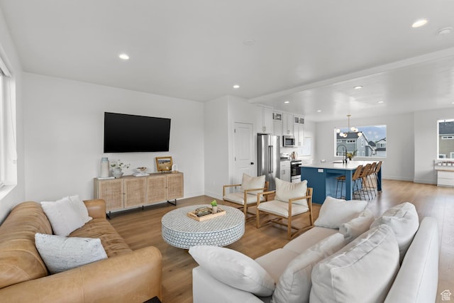 422 S 700 W, American Fork, UT 84003 - living room with recessed lighting, light wood-style floors, and baseboards