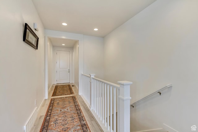 1343 N 3350 W, Provo, UT 84601 - corridor featuring inlaid floor details, an upstairs landing, recessed lighting, and baseboards