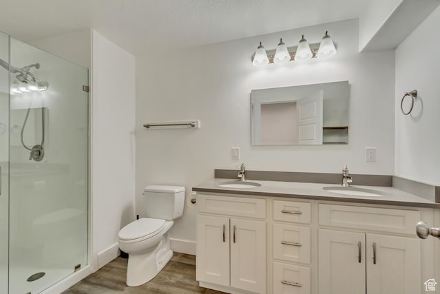 1343 N 3350 W, Provo, UT 84601 - bathroom with a shower stall, wood finished floors, toilet, and double vanity