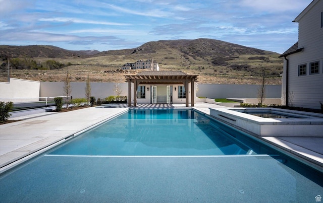 1565 N Overolook Ct, Farmington, UT 84025 - view of pool with a pergola, a mountain view, a fenced backyard, and a patio area