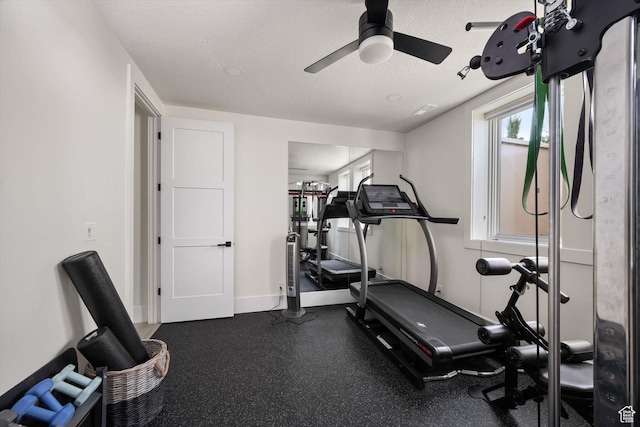 1565 N Overolook Ct, Farmington, UT 84025 - workout area with ceiling fan, a textured ceiling, and baseboards