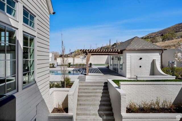 1565 N Overolook Ct, Farmington, UT 84025 - wooden terrace with a pergola, a patio area, stairway, and fence