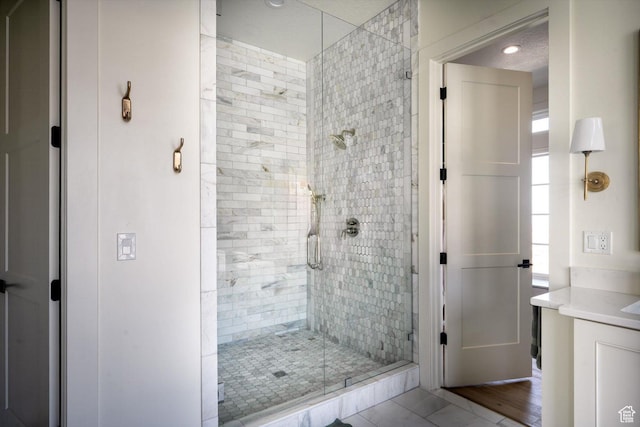 1565 N Overolook Ct, Farmington, UT 84025 - bathroom featuring a shower stall, vanity, and recessed lighting