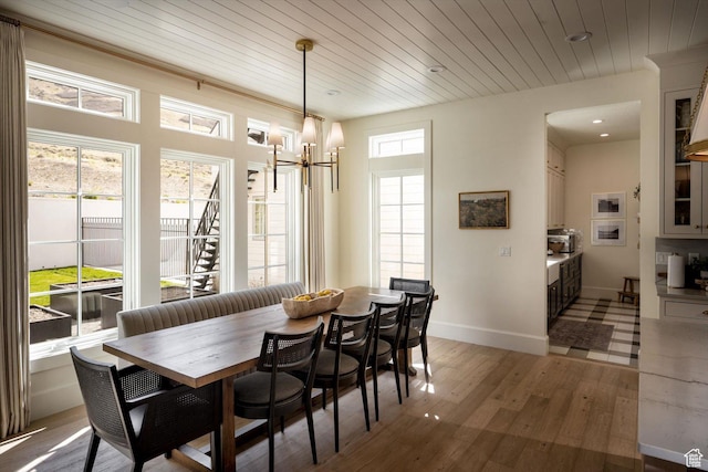 1565 N Overolook Ct, Farmington, UT 84025 - dining room featuring light wood-style flooring, a chandelier, wood ceiling, baseboards, and recessed lighting