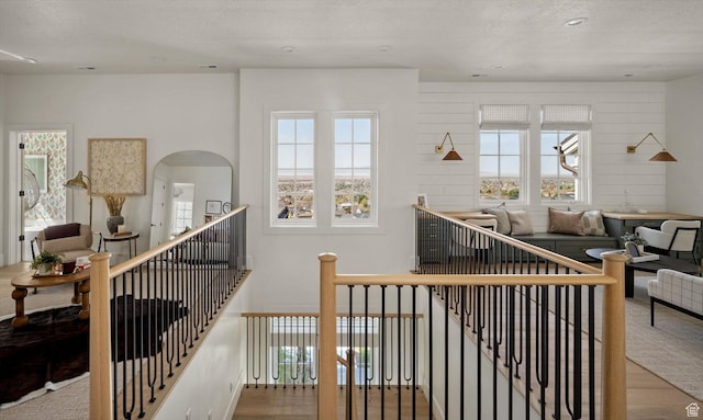 1565 N Overolook Ct, Farmington, UT 84025 - stairs featuring wood finished floors and a textured ceiling