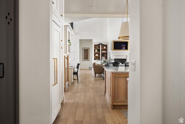 1565 N Overolook Ct, Farmington, UT 84025 - hallway with light wood-type flooring, wooden ceiling, and baseboards
