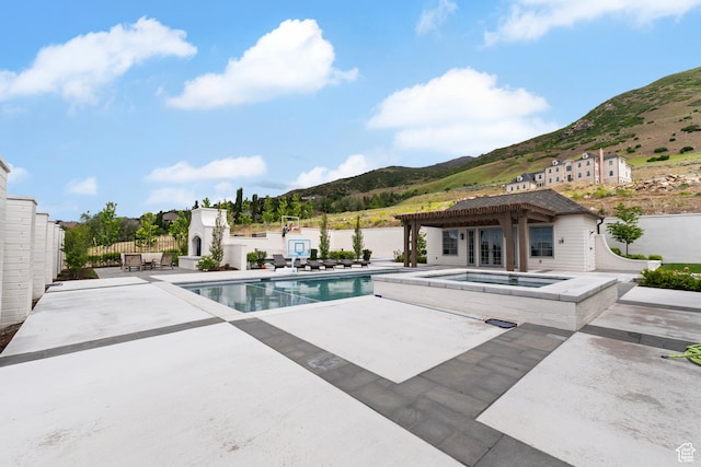 1565 N Overolook Ct, Farmington, UT 84025 - view of pool with an in-ground hot tub, a mountain view, fence, a patio area, and a pergola
