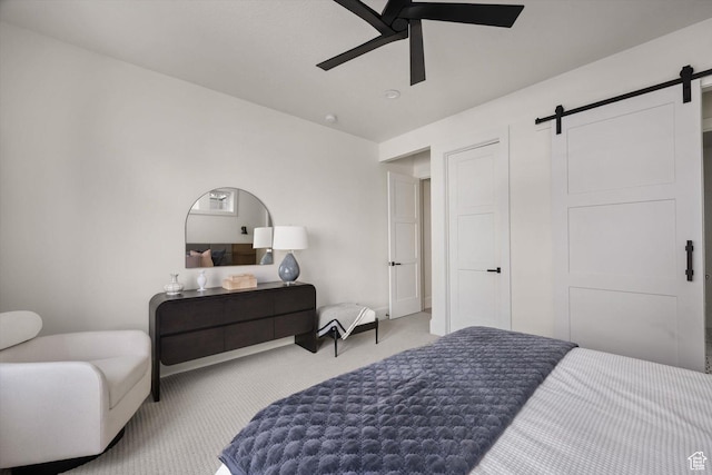 1565 N Overolook Ct, Farmington, UT 84025 - carpeted bedroom featuring a barn door and a ceiling fan