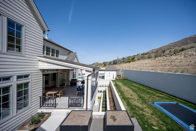 1565 N Overolook Ct, Farmington, UT 84025 - view of yard with a mountain view and a patio area