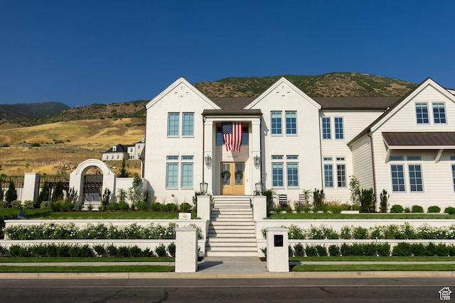 1565 N Overolook Ct, Farmington, UT 84025 - view of front of property with a mountain view, fence, and french doors
