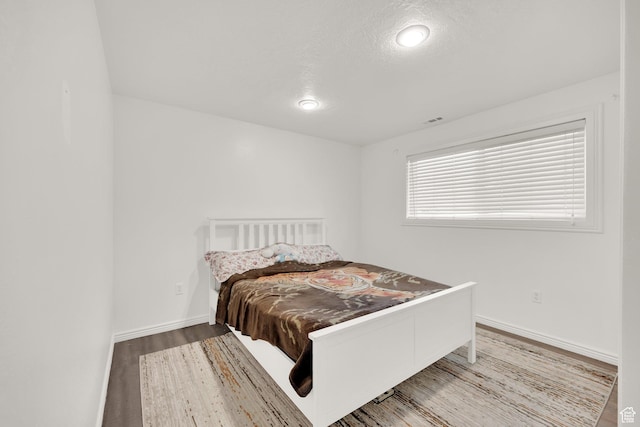 4242 S 6530 W, West Valley City, UT 84128 - bedroom with wood finished floors and baseboards