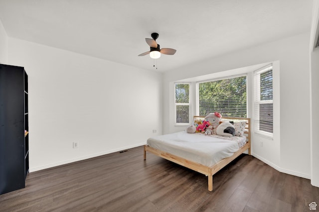 4242 S 6530 W, West Valley City, UT 84128 - bedroom with wood finished floors, baseboards, and ceiling fan