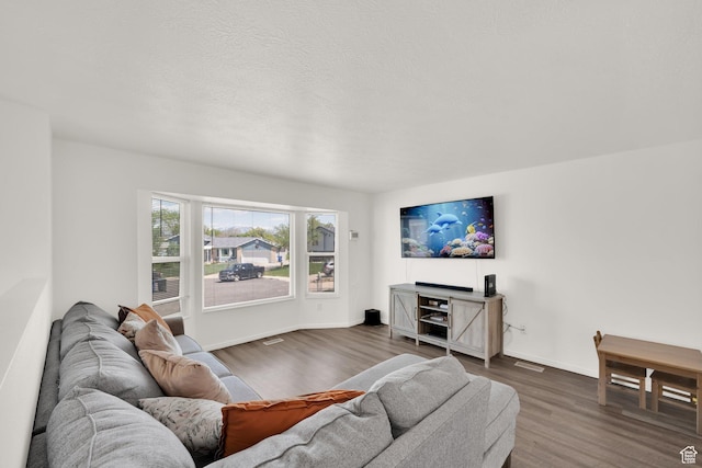4242 S 6530 W, West Valley City, UT 84128 - living room with dark wood finished floors and baseboards