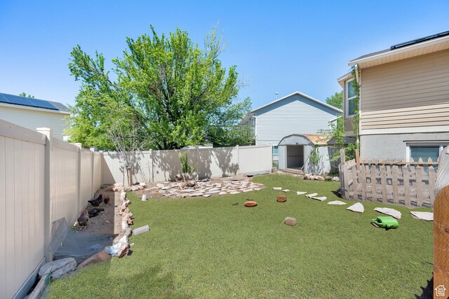 4242 S 6530 W, West Valley City, UT 84128 - view of yard with a shed and an outbuilding
