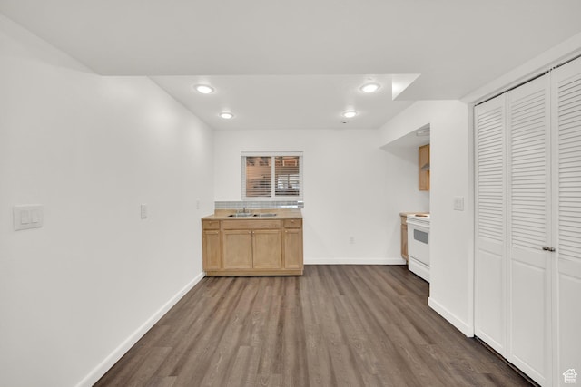 4242 S 6530 W, West Valley City, UT 84128 - kitchen featuring a sink, baseboards, dark wood-type flooring, white range with electric stovetop, and recessed lighting