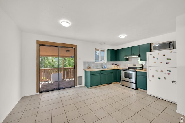 4242 S 6530 W, West Valley City, UT 84128 - kitchen featuring green cabinetry, appliances with stainless steel finishes, a sink, under cabinet range hood, and light countertops