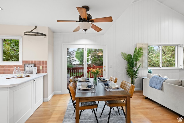 dining space featuring light wood-style flooring and a ceiling fan