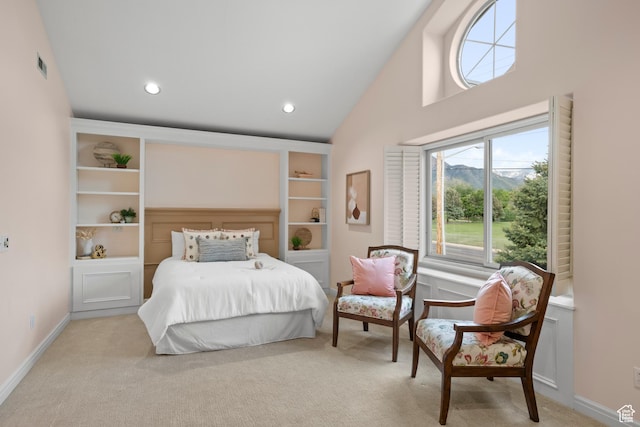 bedroom with multiple windows, light colored carpet, high vaulted ceiling, baseboards, and recessed lighting