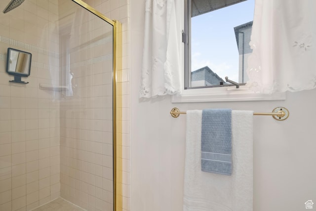 bathroom with a stall shower