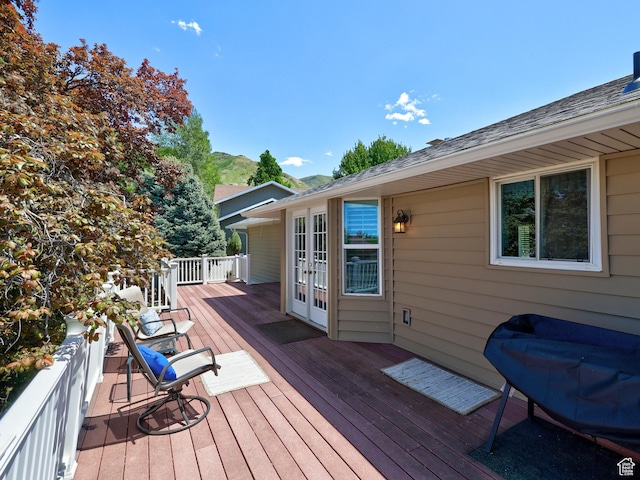 wooden terrace featuring french doors