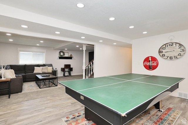 recreation room featuring recessed lighting, light wood finished floors, and baseboards