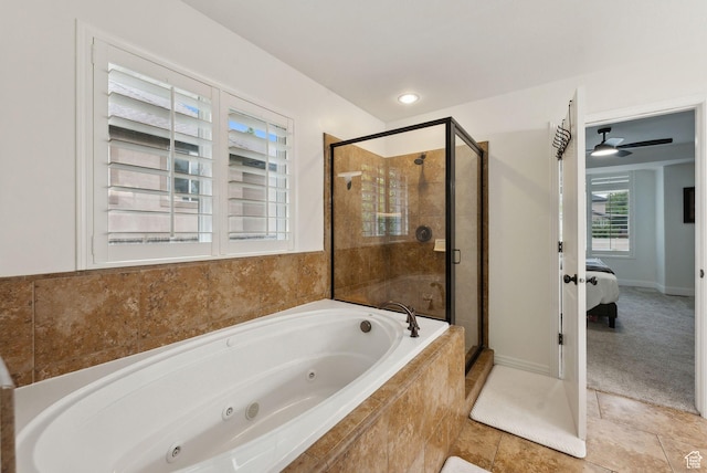 ensuite bathroom with a stall shower and a whirlpool tub
