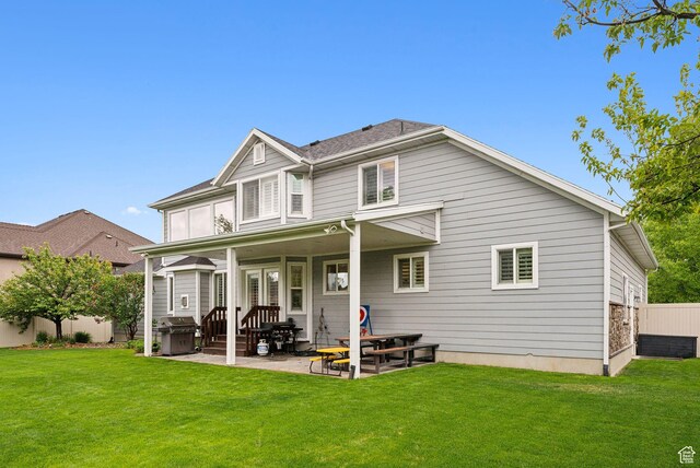rear view of house with a patio area