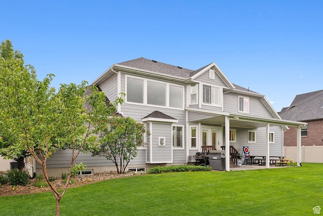rear view of property with a patio