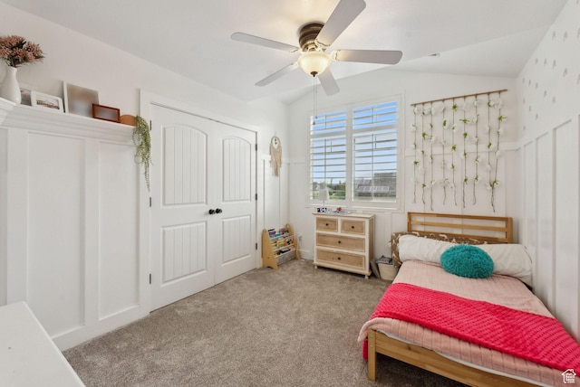 bedroom featuring carpet floors, a closet, and a ceiling fan