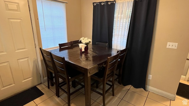 2788 Gettysburg Way, Ogden, UT 84401 - dining area with light tile patterned flooring and baseboards